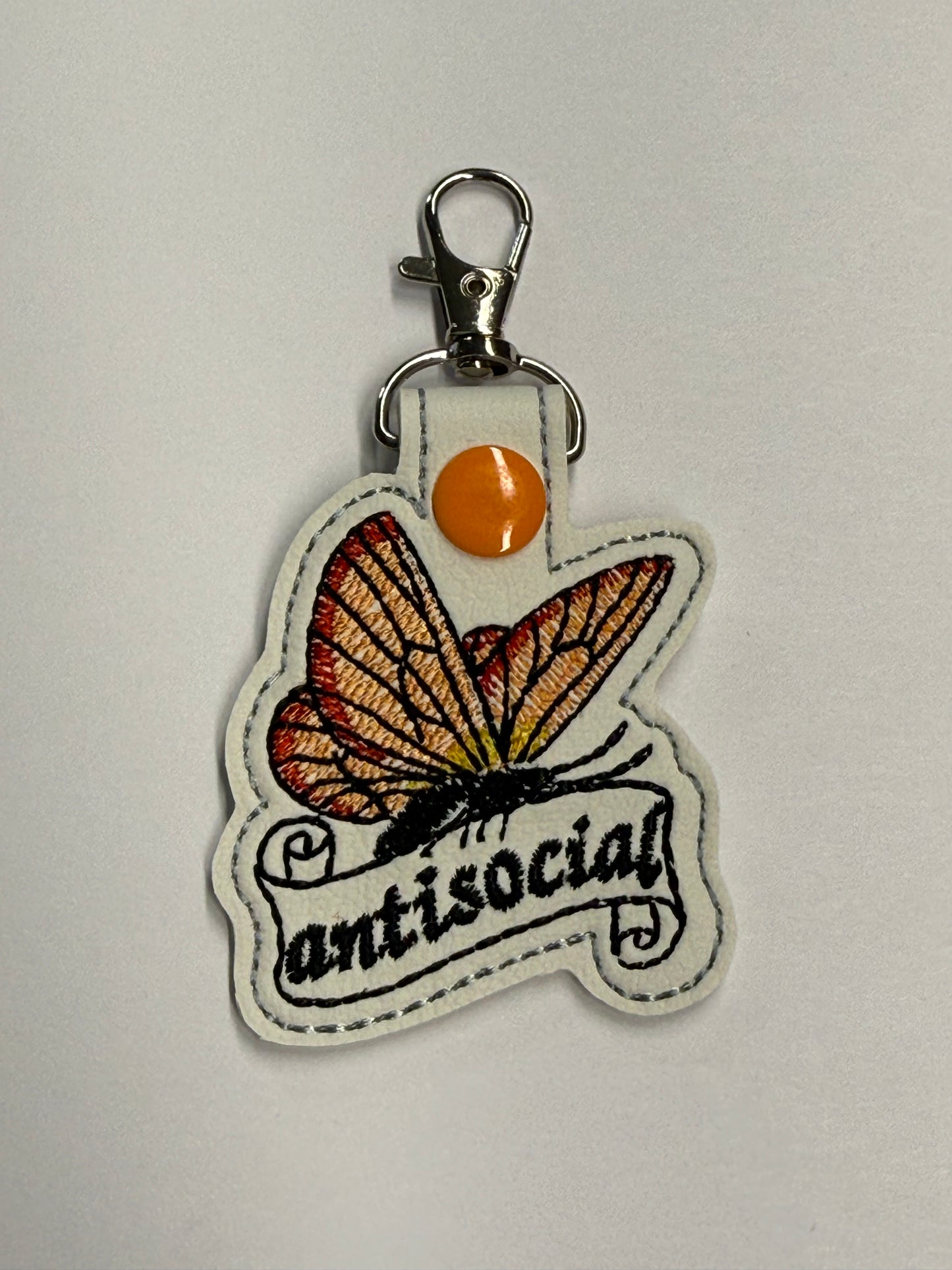 Anti-social butterfly key fob