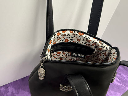 Black bag with skull details